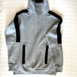 Horseback riding cowl neck pullover. Very warm! Bit of a straight cut.